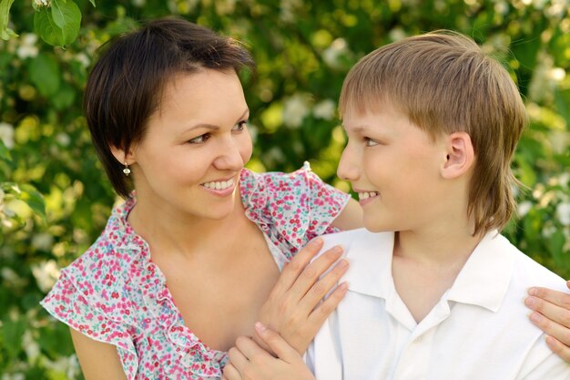 Happy mother with her son in park