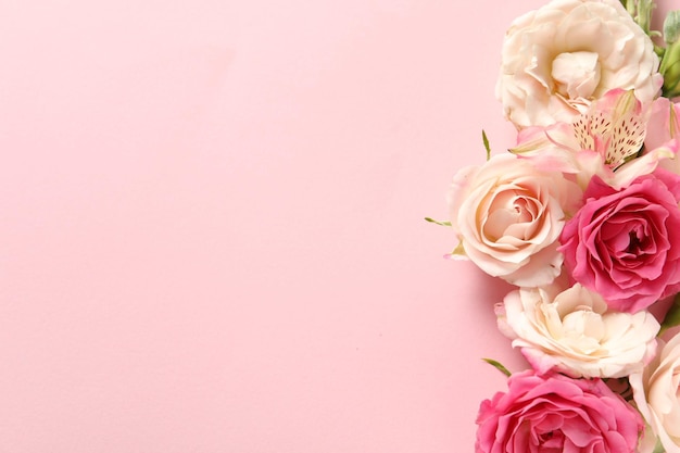 Happy Mother39s Day Beautiful roses on pink background flat lay Space for text