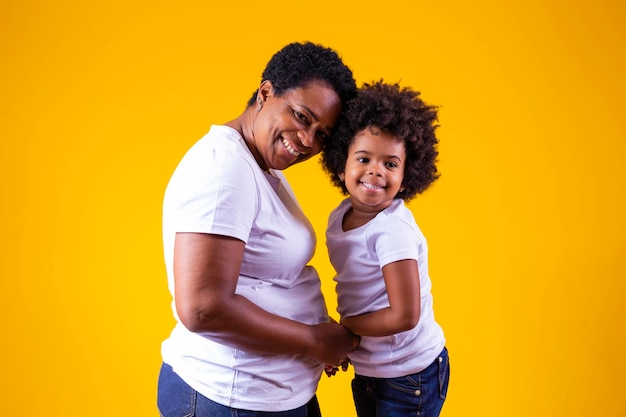 Happy mothers day adorable and sweet afro mom with cute little daughter