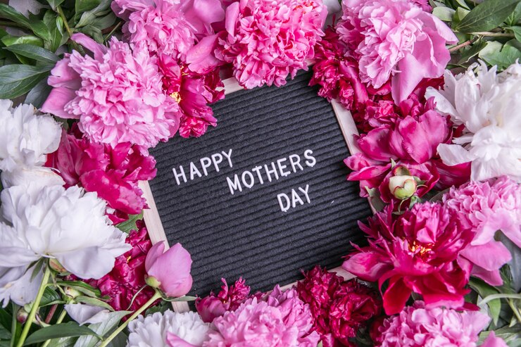Happy mothers day text and peony Stylish floral greeting card Handwritten lettering Mothers day