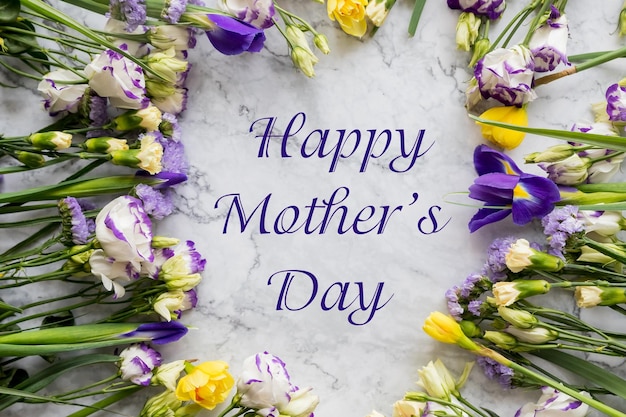 Happy mothers daybouquet of yellow narcissus flowers and on marble backgroundspring flowers for moth