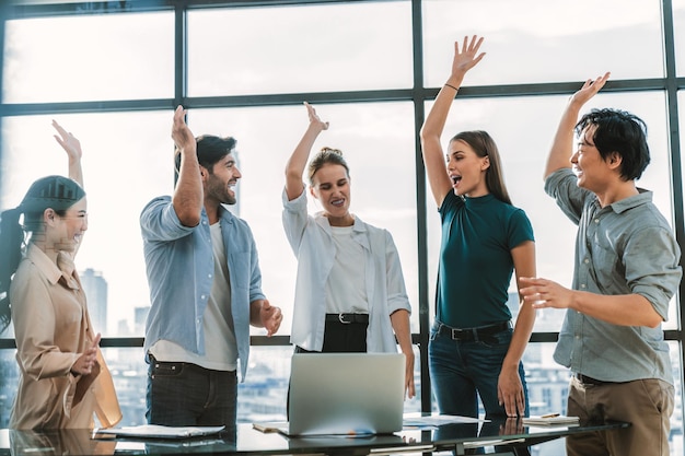 Happy multiethnic businesspeople raised hand for voting answering Tracery