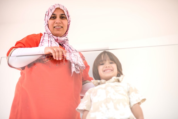 Happy muslim family at new modern home