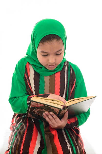 Happy Muslim Girl reading quran