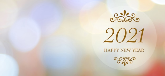 Happy New Year 2021 on blur abstract bokeh background with copy space for text, new year greeting card, banner