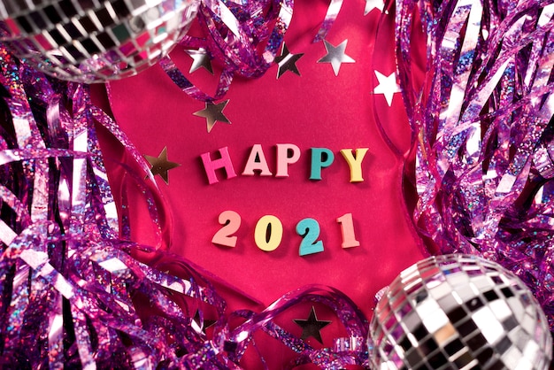 Happy New Year 2021, greeting card with tinsel and disco ball