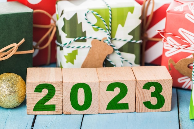 Happy New Year 2023, Christmas 2023, Christmas gifts placed in a festive atmosphere