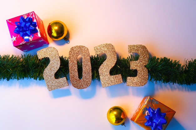 Happy New Year 2023 Golden numbers Christmas white background