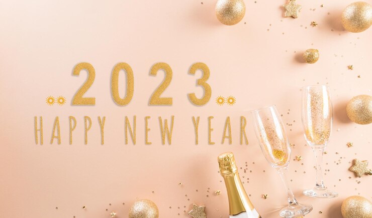 Photo happy new year celebration background concept golden christmas ball star and champagne glasses on pastel background