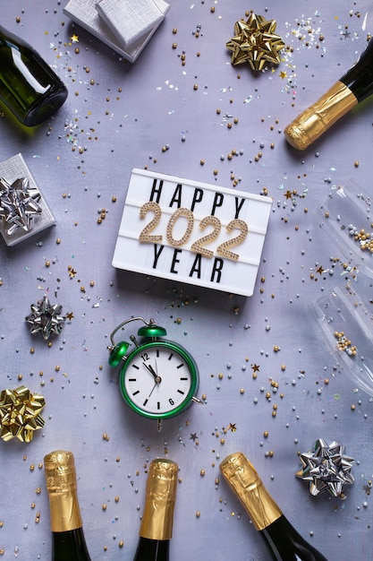 Happy new year greeting card  with champagne confetti