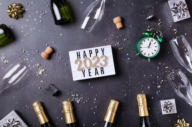 Happy new year greeting card  with champagne confetti