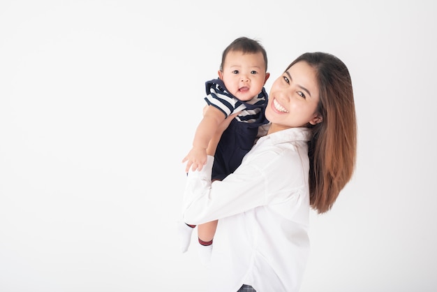 Happy newborn cute baby and beautiful mom