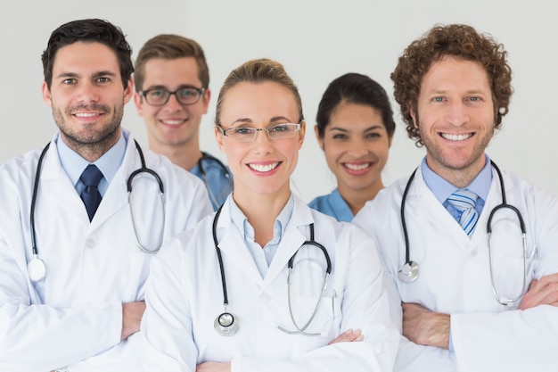 Happy nurses and doctors in hospital