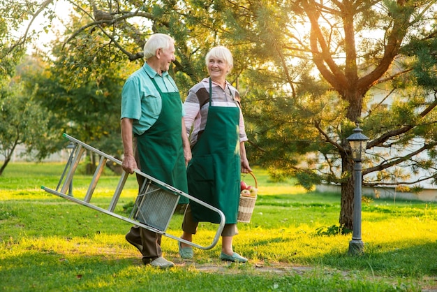 Happy old couple holding hands