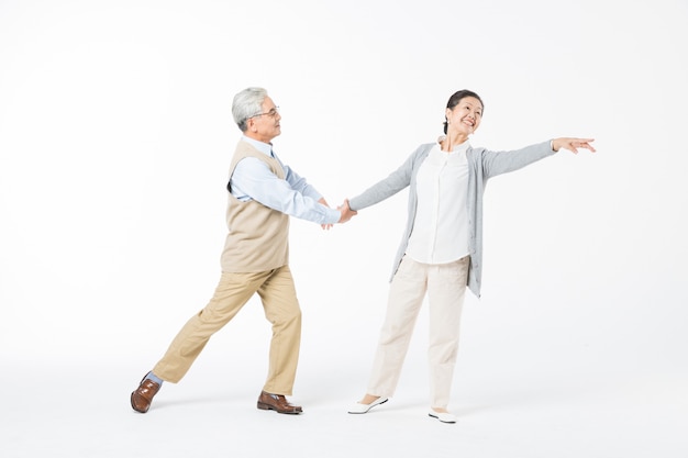 Happy old couples dancing isolate