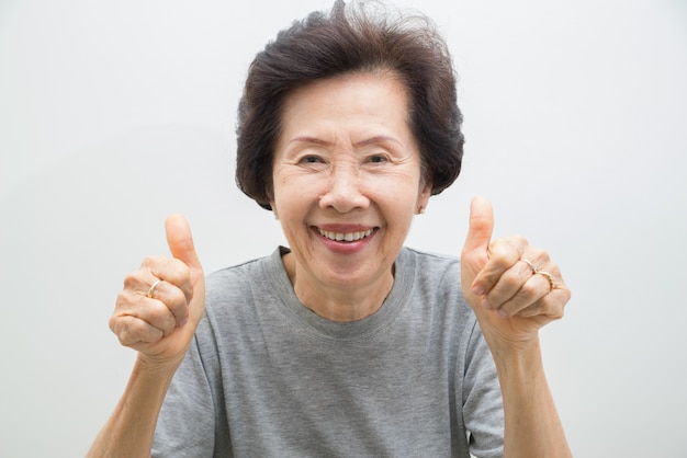 Happy old Woman Portrait  with Thumbs up, smailing old women