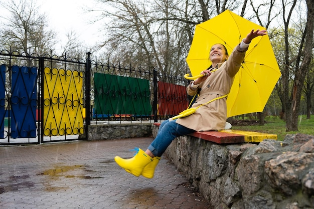 Happy older women having fun outdoor senior cheerful mature elderly retired woman with yellow