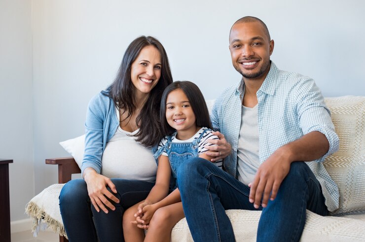 Happy parents with daughter
