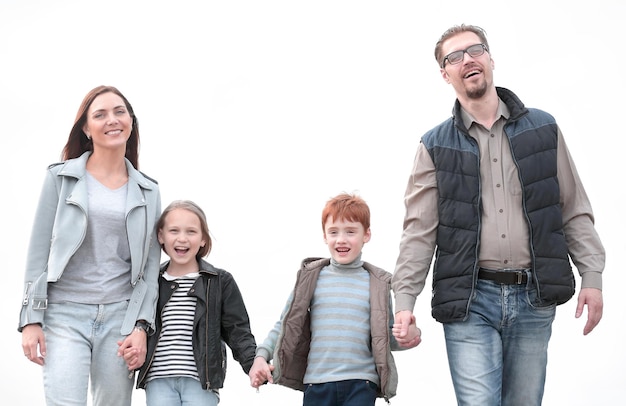 Happy parents with their children holding each other's hands photo with copy space