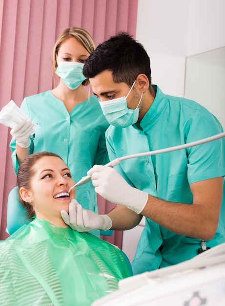 Happy patient at dental clinic