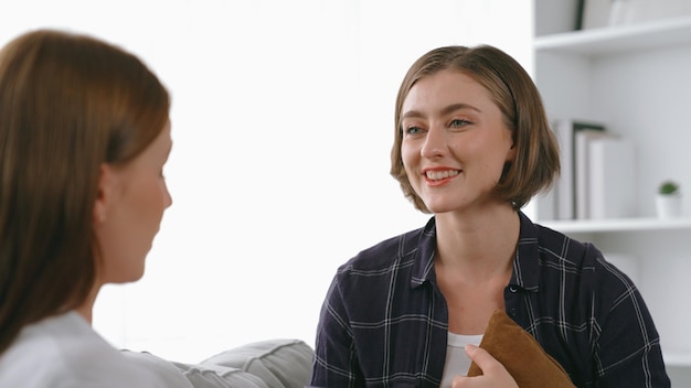 Happy patient and psychologist have mental prim conversation in clinic