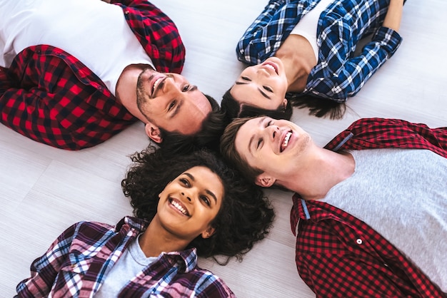 The happy people laying on the floor