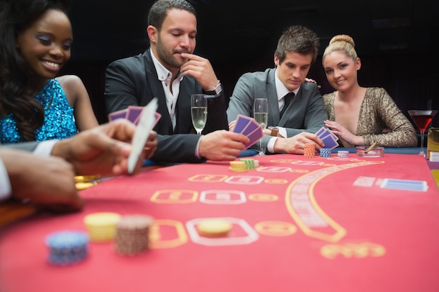 Happy people playing poker