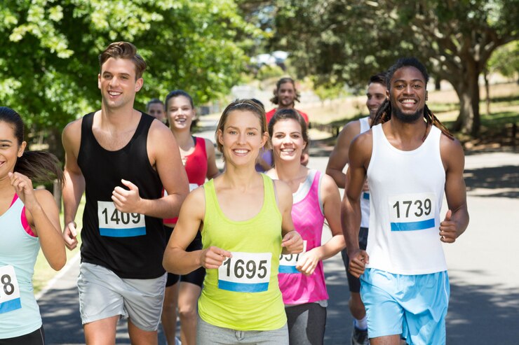 Photo happy people running race in park