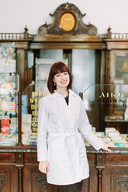 Happy pharmacist at the pharmacy