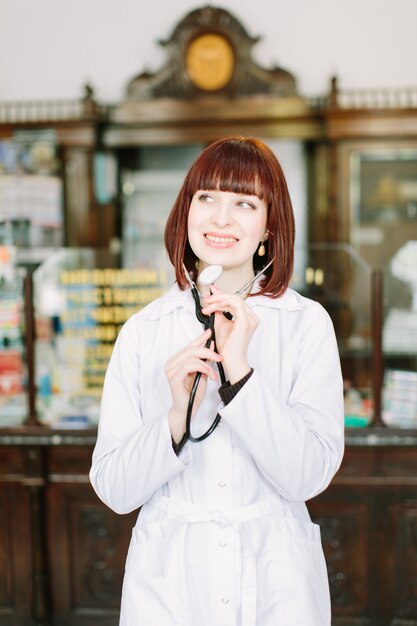 Happy pharmacist at the pharmacy