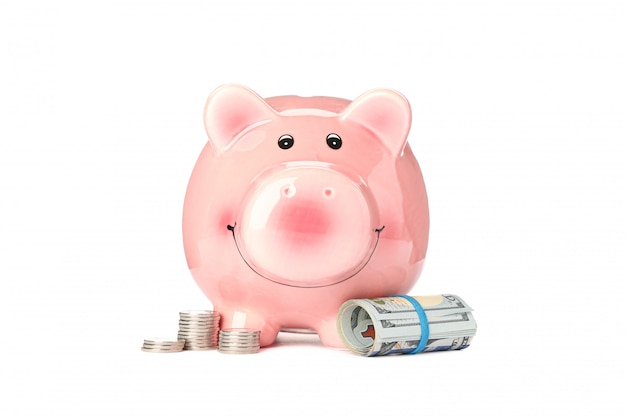 Happy piggy bank with money isolated on white background