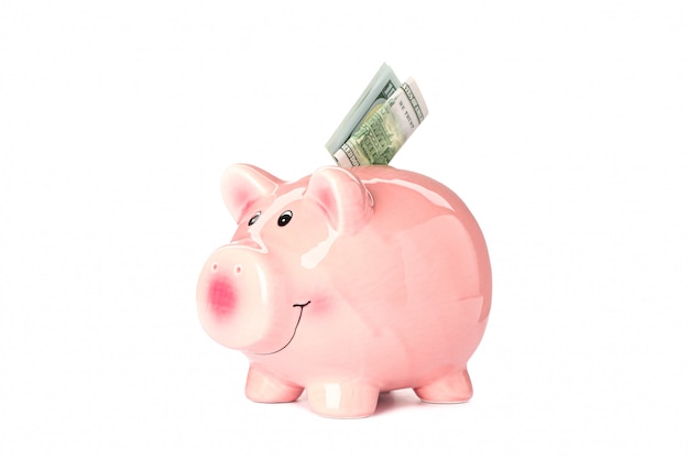 Happy piggy bank with money isolated on white background