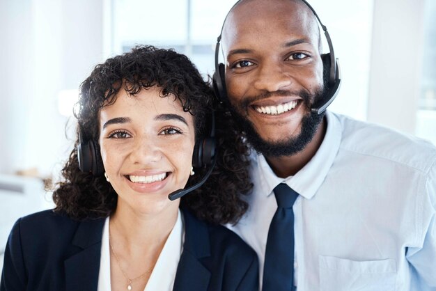 Happy portrait and customer service consultants in the office working on a crm consultation online Happiness smile and interracial telemarketing colleagues taking a picture together in workplace