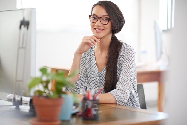 happy portrait or woman on computer for problem solving project solution or online troubleshooting startup programming upgrade or confident web developer thinking of information technology system