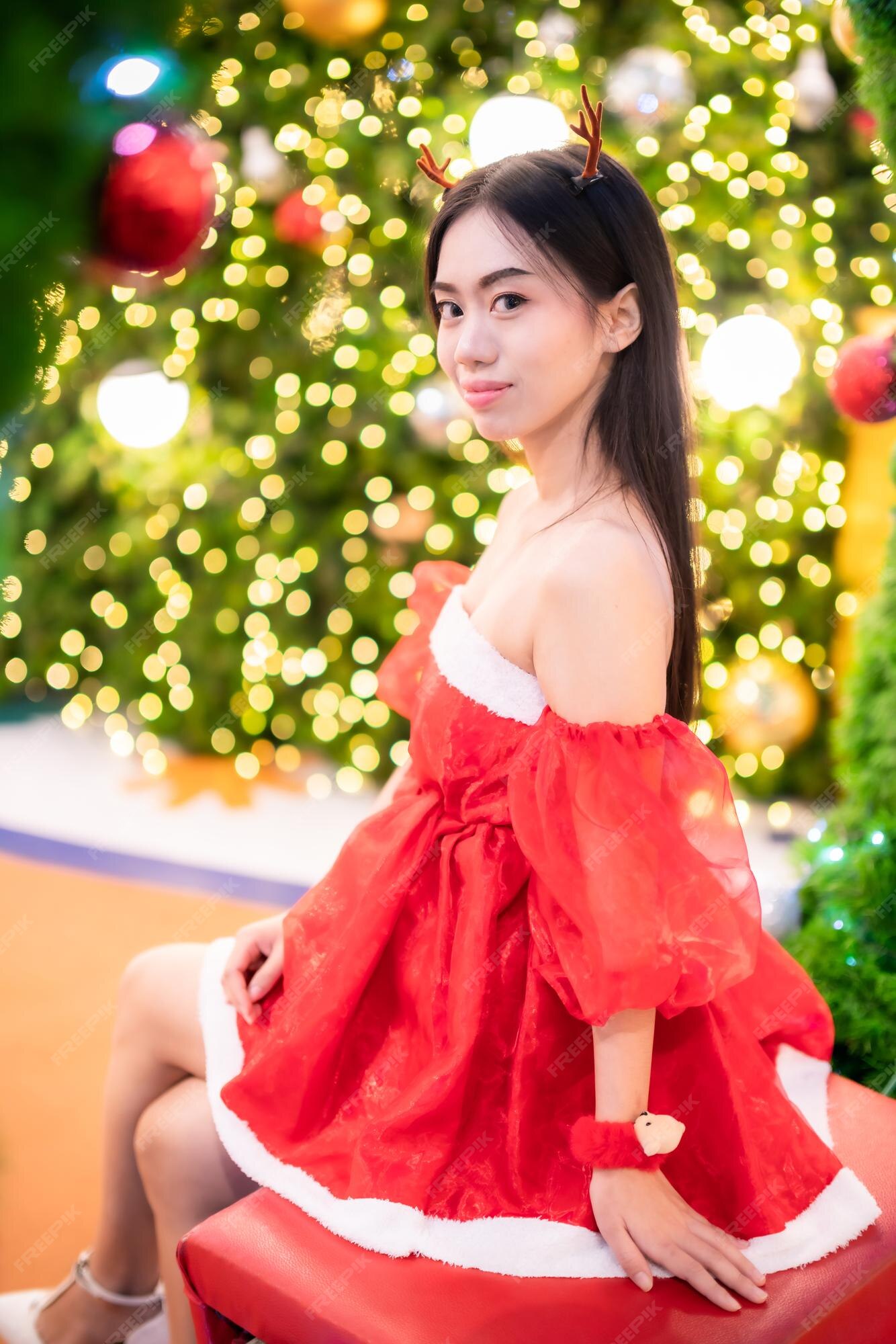 Premium Photo | Happy portrait young asian woman santa costume and ...