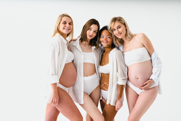 Group Of Happy Friends In Underwear Over White Background Stock Photo,  Picture and Royalty Free Image. Image 69020346.