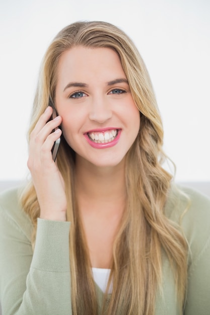 Happy pretty blonde on the phone