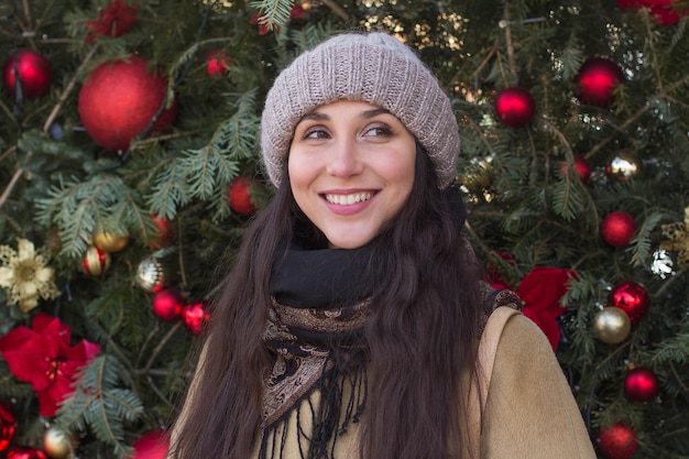 Happy pretty girl during Christmas holidays