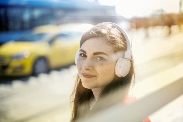 Happy pretty girl with headphones