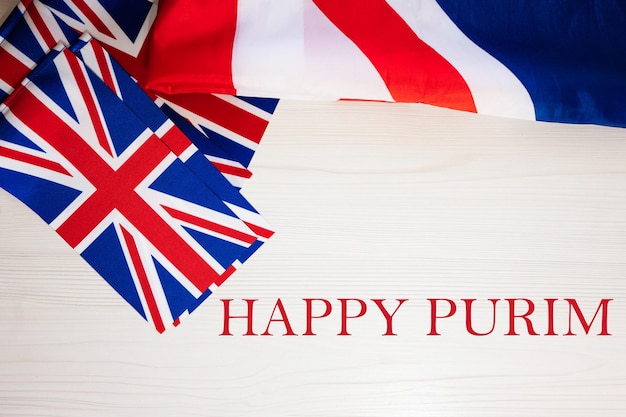 Happy Purim British holidays concept Holiday in United Kingdom Great Britain flag background