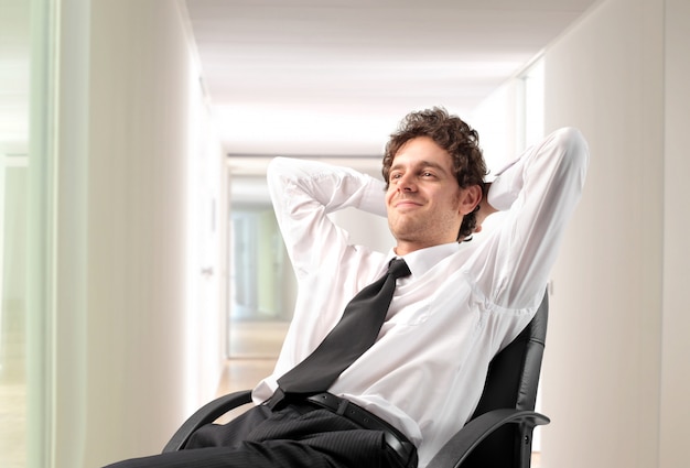 Happy relaxed businessman