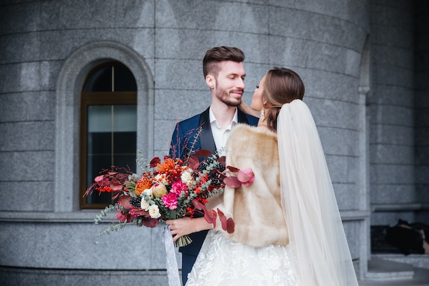 Happy romantic young couple celebrating their marriage