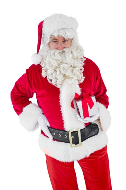 Happy santa claus holding a gift