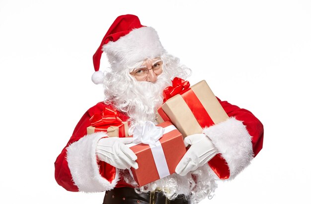 Happy Santa Claus holding presents