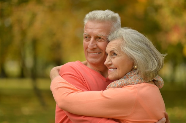 Happy senior couple hugging