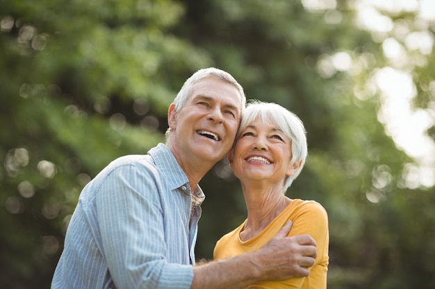 Happy senior couple in park