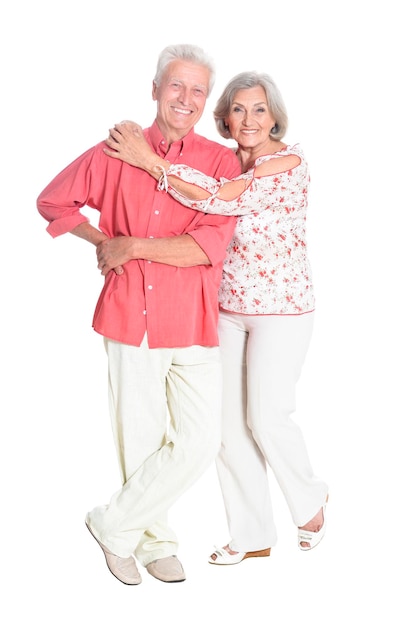 Happy senior couple posing isolated on white background