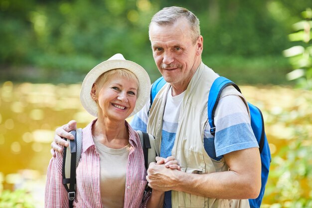 Happy senior hikers outdoors