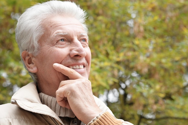 Happy senior man in park