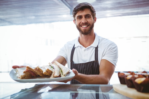  Happy server showing sandwich 